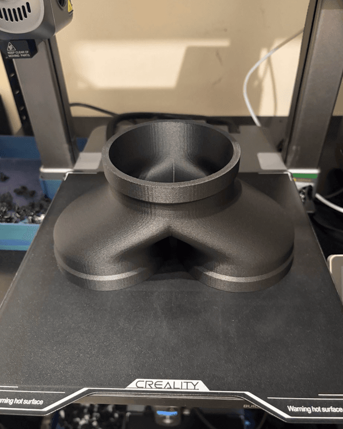 3D printed Y-shaped component on printer bed